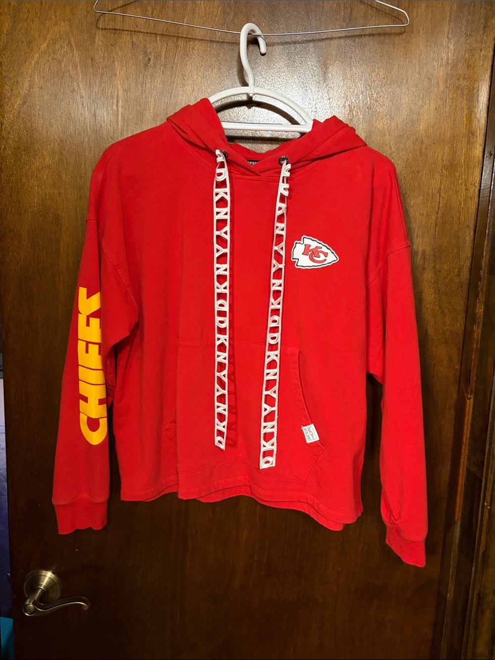 DKNY Red Hooded Sweatshirt with Yellow Sleeve Print
